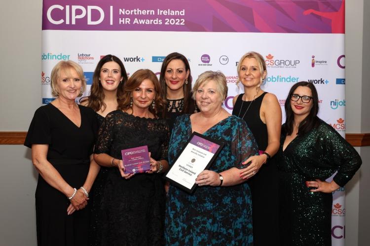 Photograph of NICS colleagues with the CIPD HR AWard 2022 for Best Diversity & Inclusion initiative
